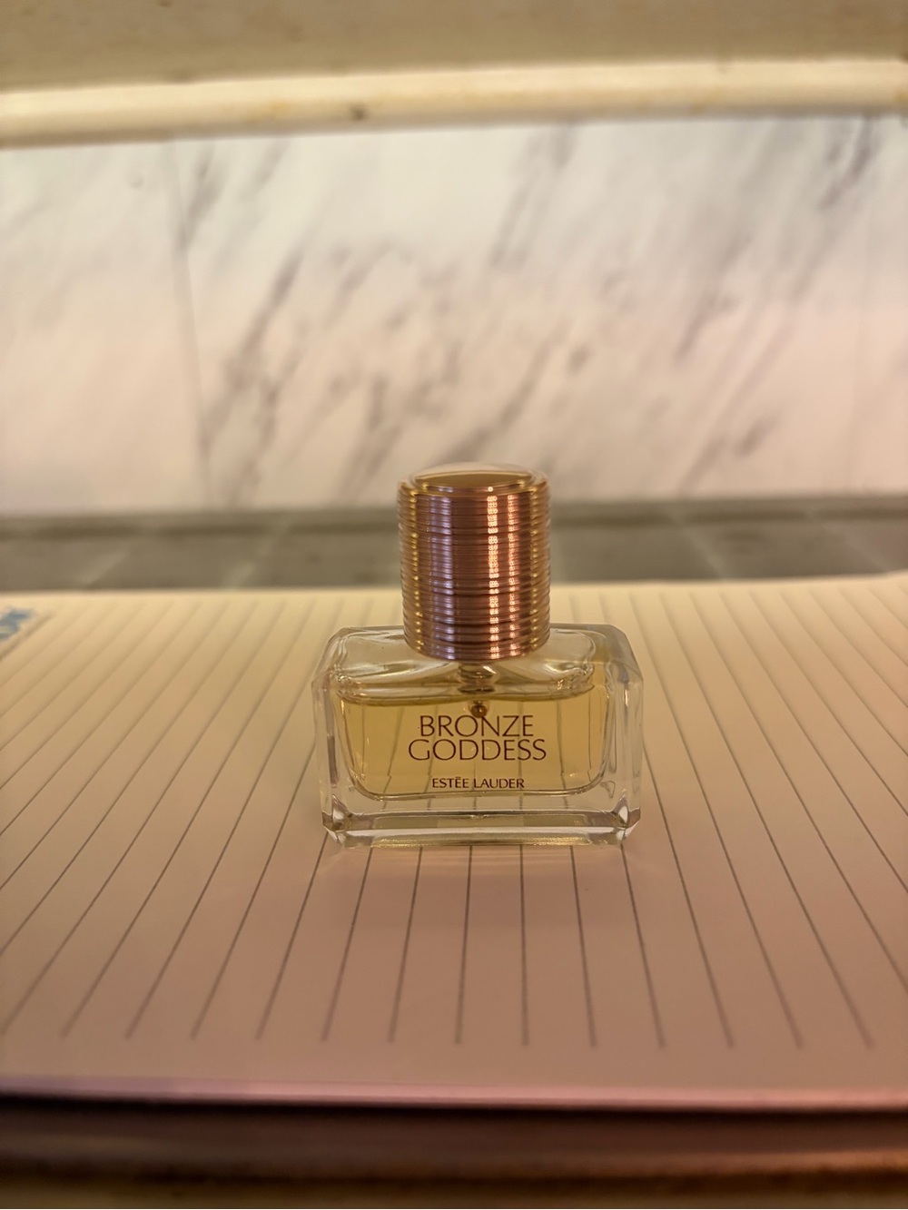 Estee Lauder Bronze Goddess Mini Bottle in Bronze and Clear